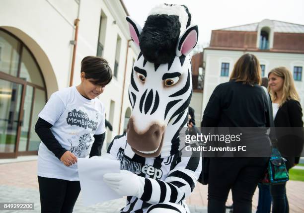 Juventus junior members meet club mascot Jay during the official First Team Squad Photocall on September 18, 2017 in Turin, Italy.