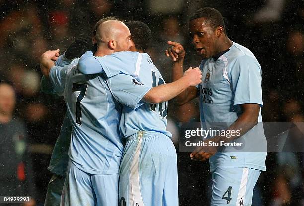 Manchester City goalscorer Stephen Ireland celebrates with Nedum Onuoha after scoring during the UEFA Cup round of 32, 1st leg game between FC...