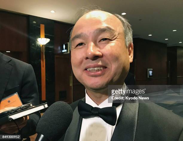 SoftBank Group Corp. Chairman and CEO Masayoshi Son speaks to reporters in New York on Sept. 18, 2017. Son said the Japanese telecommunications...