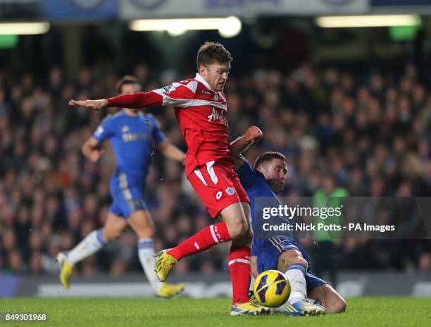 Queens Park Rangers' Jamie Mackie and Chelsea's Gary Cahill in action