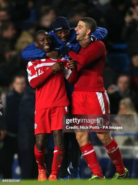 Queens Park Rangers' Shaun Wright-Phillips, Samba Diakite and Adel Taarabt celebrate victory after the final whistle