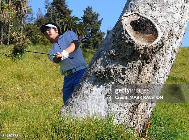 Japanese teen golf sensation Ryo Ishikawa plays from the rough at the fifth hole on day one of the Northern Trust Open at the Riviera Country Club in...