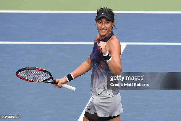 Caroline Garcia of France celebrates winning her match against Aliaksandra Sasnovich of Belarus during day two of the Toray Pan Pacific Open Tennis...