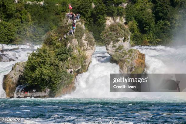 river rhine waterfall, rheinfall with rainbow, canton schaffhausen, switzerland - chutes du rhin photos et images de collection
