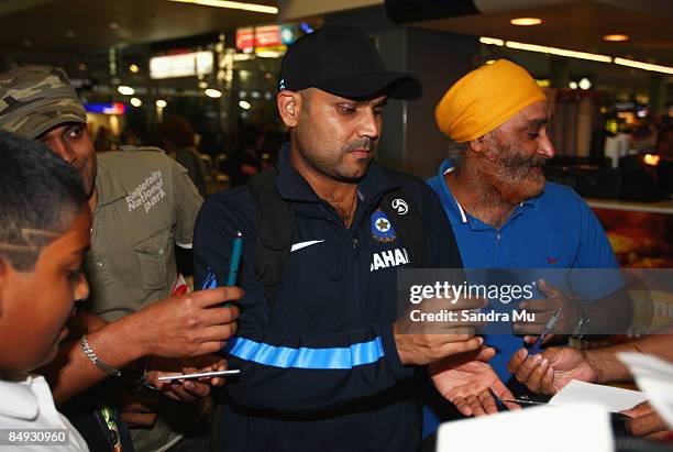 Virender Schwag of India walks through the arrivals hall as the Indian cricket team arrive at Auckland International Airport on February 20, 2009 in...