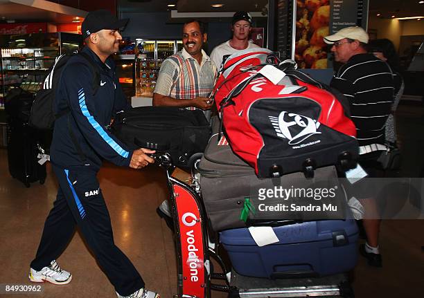 Virender Schwag of India walks through the arrivals hall as the Indian cricket team arrive at Auckland International Airport on February 20, 2009 in...