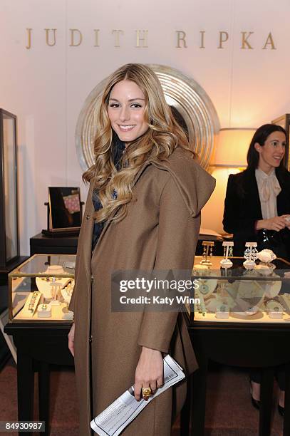 Personality Olivia Palermo poses at the Judith Ripka booth during Mercedes-Benz Fashion Week 2009 at Bryant Park on February 19, 2009 in New York...