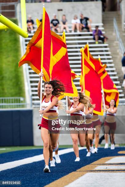 Iowa State Cyclones cheerleaders run the Iowa State banners thru the end zone after an Iowa State touchdown during the first quarter of the college...