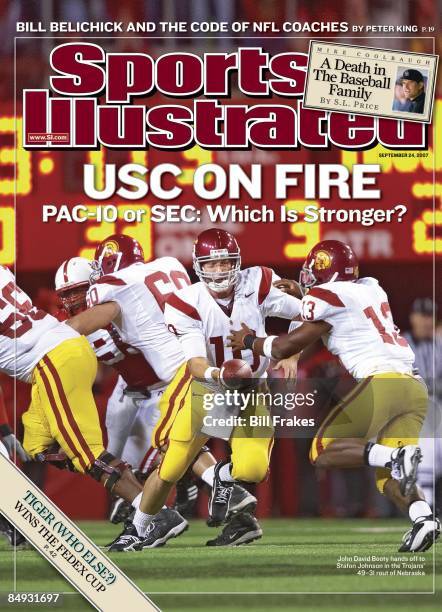 September 24, 2007 Sports Illustrated via Getty Images Cover: College Football: USC QB John David Booty in action, making handoff to Stafon Johnson...