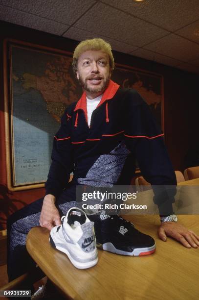 Portrait of Nike Inc co-founder and president Phil Knight holding Air Jordan sneaker. Beaverton, OR CREDIT: Rich Clarkson