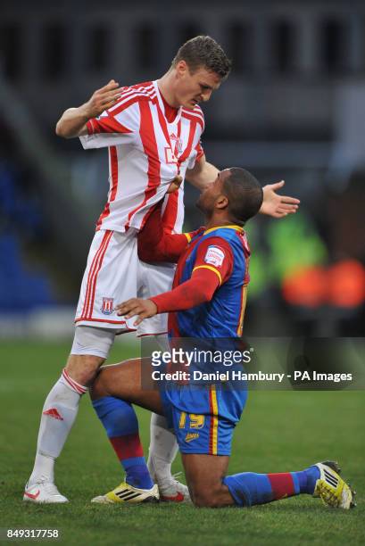 Crystal Palace's Jermaine Easter grabs Stoke's Robert Huth during the FA Cup Third Round match at Selhurst Park, London.