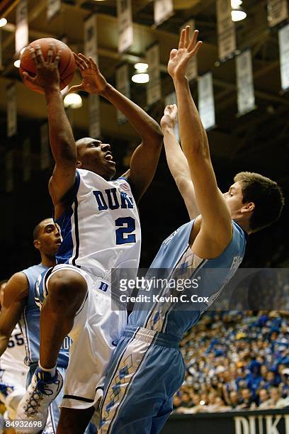 Nolan Smith of the Duke Blue Devils goes up with the ball against Bobby Frasor of the North Carolina Tar Heels during the game on February 11, 2009...
