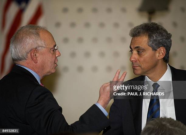 White House Chief of Staff Rahm Emanuel talks with former White House spokesman Barry Toiv, as they wait for a swearing-in ceremony for Central...