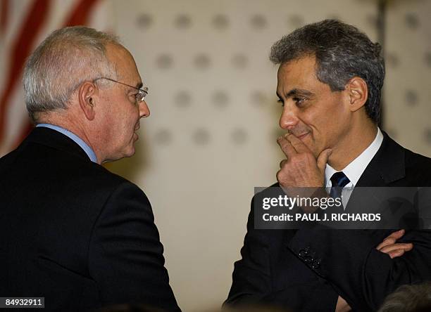 White House Chief of Staff Rahm Emanuel talks with former White House spokesman Barry Toiv, as they wait for a swearing-in ceremony for Central...