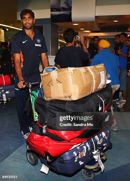 Munaf Patel of India walks through the arrivals hall as the Indian cricket team arrive at Auckland International Airport on February 20, 2009 in...