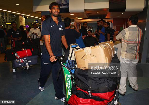 Munaf Patel of India walks through the arrivals hall as the Indian cricket team arrive at Auckland International Airport on February 20, 2009 in...
