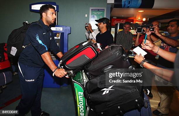 Yuraj Singh of India walks through the arrivals hall as the Indian cricket team arrive at Auckland International Airport on February 20, 2009 in...