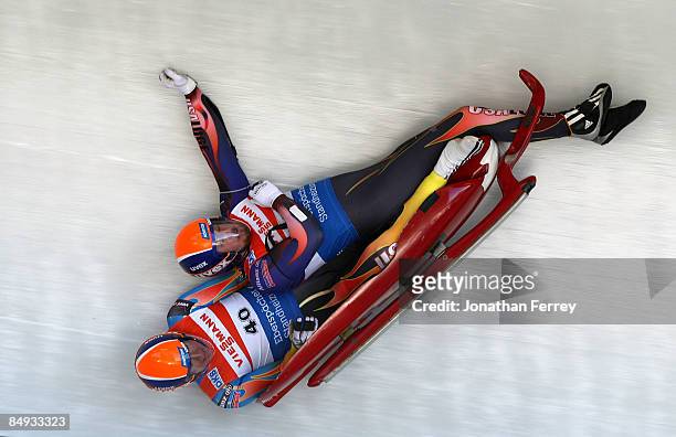 Matthew Mortensen and Preston Griffall of the United States crash during training for the Wiessmann Luge World Cup on February 19, 2009 at the...