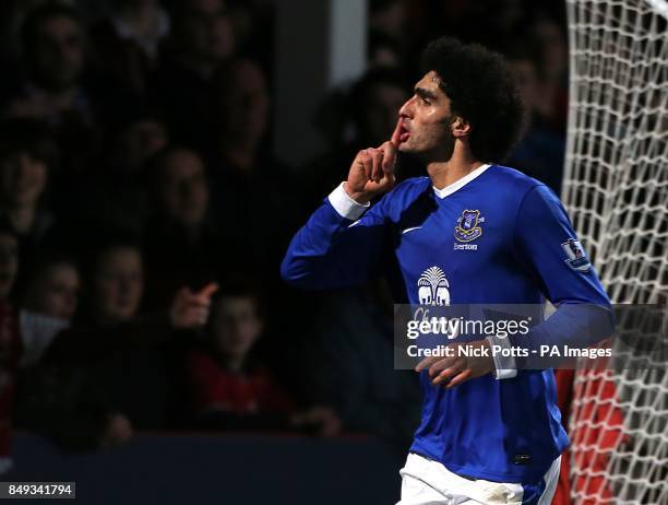 Everton's Marouane Fellaini celebrates scoring his side's fifth goal