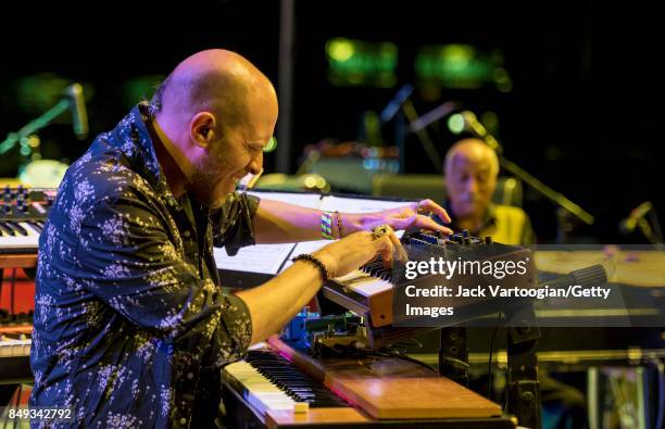 American Jazz musician Jason Lindner plays keyboards as he performs with Mulatu Astatke's band at Central Park SummerStage, New York, New York,...