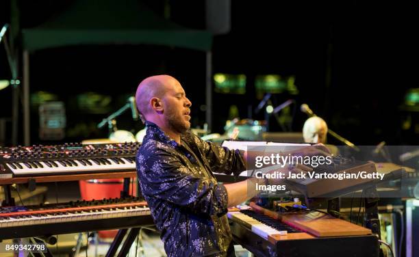 American Jazz musician Jason Lindner plays keyboards as he performs with Mulatu Astatke's band at Central Park SummerStage, New York, New York,...