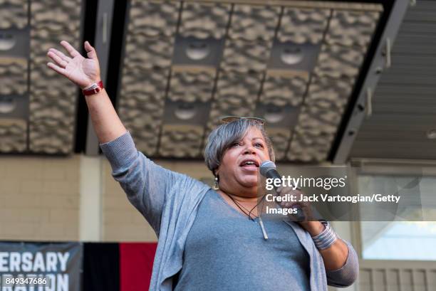 Radio personality Sheila Anderson speaks from the stage at the 25th Annual Charlie Parker Jazz Festival in Harlem's Marcus Garvey Park, New York, New...