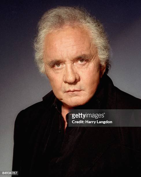 Singer Johnny Cash poses for a portrait in 2002 in Los Angeles, California.