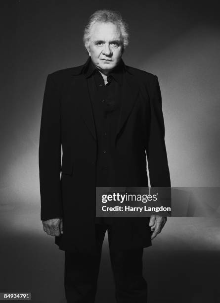 Singer Johnny Cash poses for a portrait in 2002 in Los Angeles, California.