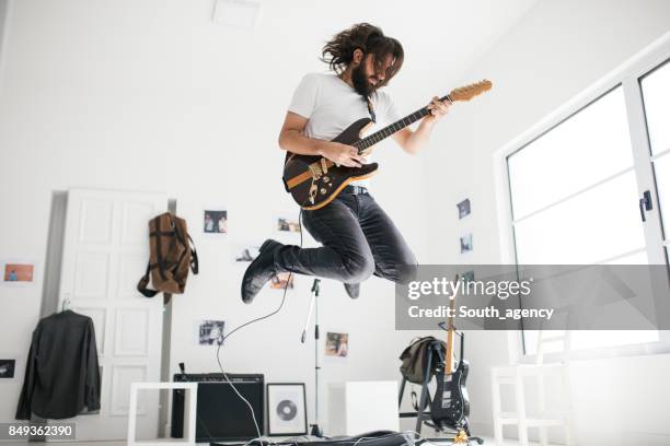 handsome guitarist - loud man imagens e fotografias de stock