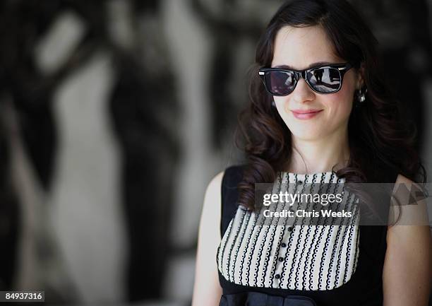 Actress Zooey Deschanel attends a luncheon hosted by Oliver Peoples and Van Cleef & Arpels at a private residence on February 19, 2009 in Los...