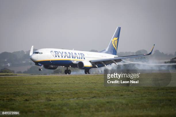 Ryanair passenger plane lands on the runway at Luton airport on September 19, 2017 in Luton, England. Passengers are facing severe travel disruption...