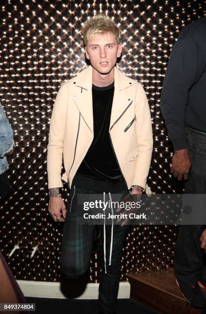 Machine Gun Kelly poses backstage before a Private Show at The Peppermint Club on September 18, 2017 in Los Angeles, California.