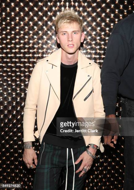 Machine Gun Kelly poses backstage before a Private Show at The Peppermint Club on September 18, 2017 in Los Angeles, California.
