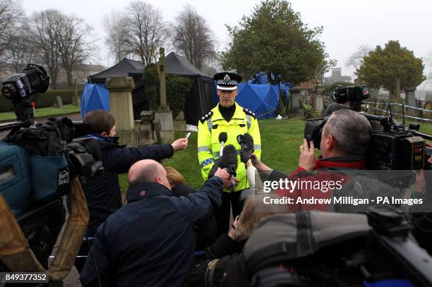 Chief Inspector Kenny Macleod speaks to the media at Old Monkland Cemetery in Coatbridge, where police finished an exhumation of a gravesite in the...