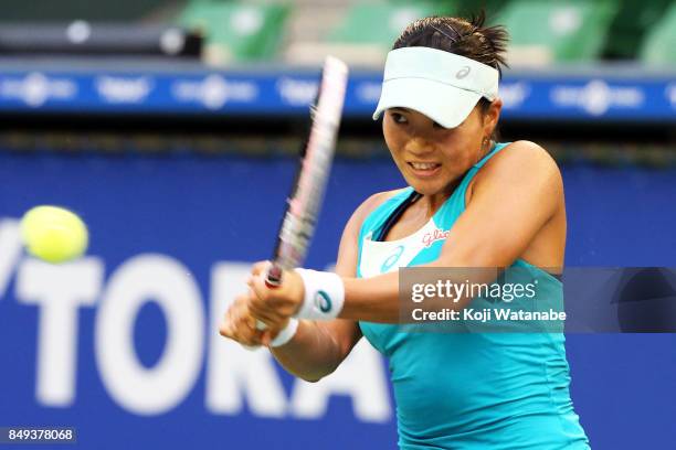 Risa Ozaki of Japan plays a backhand in her match against Shelby Rogers of the United States during day two of the Toray Pan Pacific Open Tennis At...