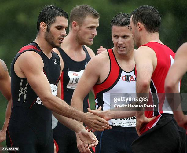 James Dolphin of North Harbour Bays congratulates Adam Somerville after competing in the Men's 100m final during the 2009 Black Singlet Invitational...