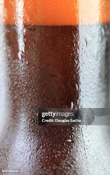 full frame of condensation on a beer bottle - natale stockfoto's en -beelden