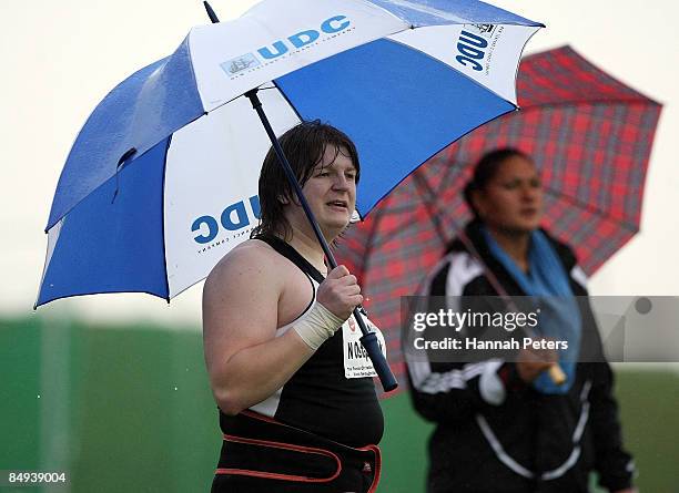 Nadezhda Ostapchuk of Belarus looks on with Valerie Vili of New Zealand during the Women's Shot Put Final during the 2009 Black Singlet Invitational...