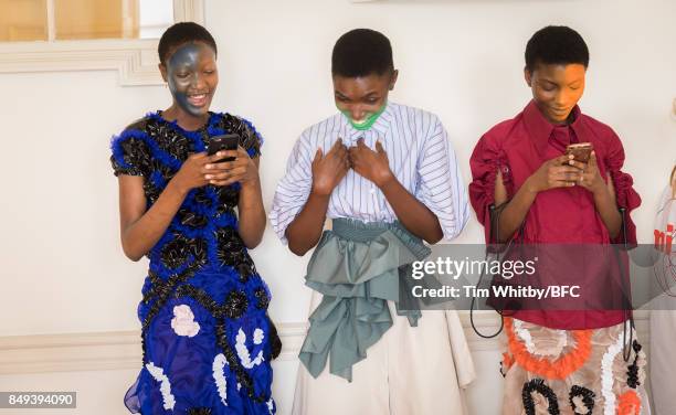 Models backstage ahead of the minki presentation during London Fashion Week September 2017 on September 19, 2017 in London, England.