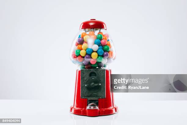 classic gumball machine - old fashioned candy stock pictures, royalty-free photos & images
