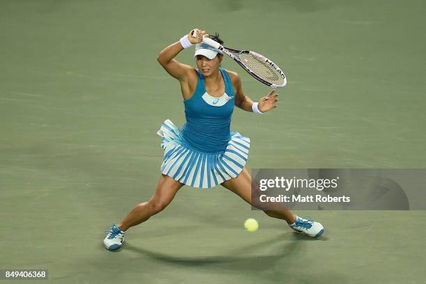 Risa Ozaki of Japan plays a forehand against Shelby Rogers of the USA during day two of the Toray Pan Pacific Open Tennis At Ariake Coliseum on...