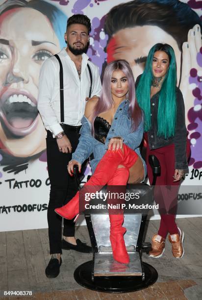 Danny Robinson, Katie Salmon and Jennafer Lee at the 'Just Tattoo Of Us: Can You Deal With The Reveal' pop-up tattoo parlour on September 19, 2017 in...