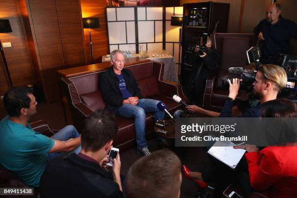 John McEnroe, Team World Captain talks to the media after arriving at Vaclav Havel Airport Prague ahead of the Laver Cup on September 19, 2017 in...