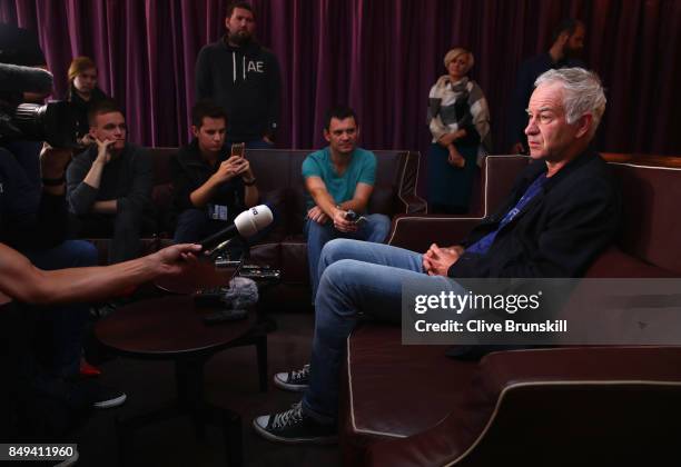 John McEnroe, Team World Captain talks to the media after arriving at Vaclav Havel Airport Prague ahead of the Laver Cup on September 19, 2017 in...