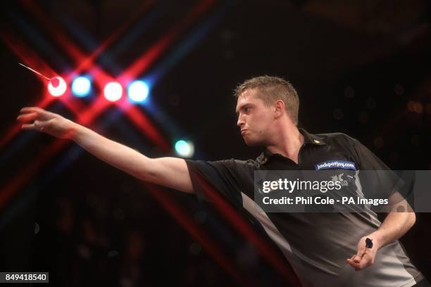 Richie George in action against Scott Waites during the BDO World Professional Darts Championships at the Lakeside Complex, Surrey.