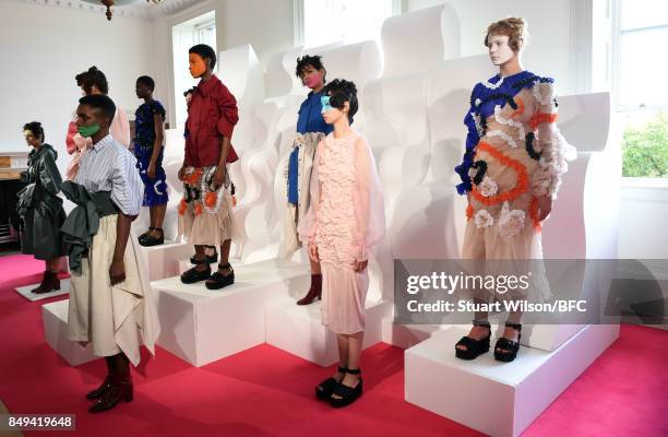 Models showcase designs at the minki presentation during London Fashion Week September 2017 on September 19, 2017 in London, England.