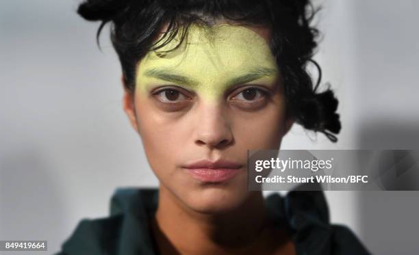 Models showcase designs at the minki presentation during London Fashion Week September 2017 on September 19, 2017 in London, England.