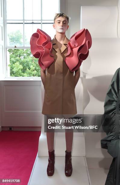 Models showcase designs at the minki presentation during London Fashion Week September 2017 on September 19, 2017 in London, England.