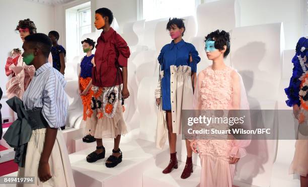 Models showcase designs at the minki presentation during London Fashion Week September 2017 on September 19, 2017 in London, England.