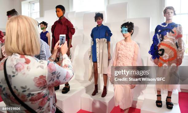 Models showcase designs at the minki presentation during London Fashion Week September 2017 on September 19, 2017 in London, England.